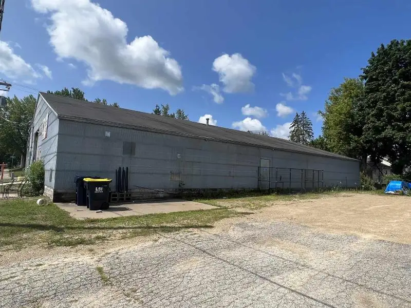 Versatile Mixed-use Property with Office Space and Storage in Residential Area