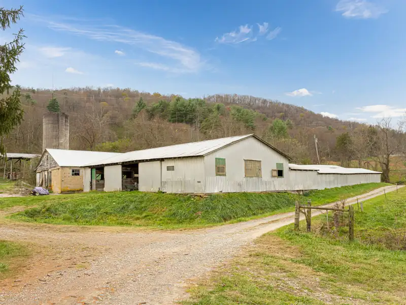 Unique 268-acre Asheville Property with Mountain Views, Homestead, and Horse Facilities