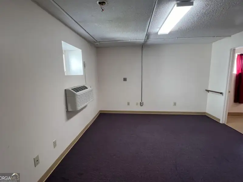 Two-level Commercial Unit with 26 Living/office Spaces in Re-zoned R4 Area