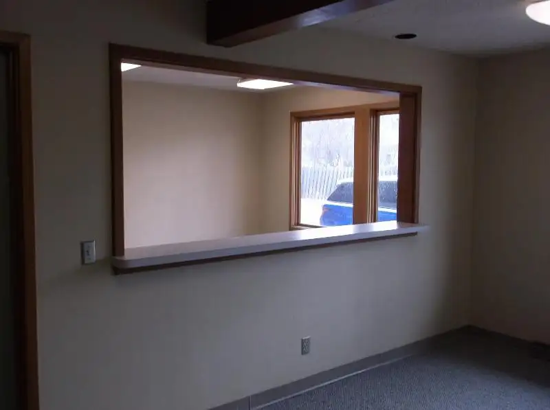 Remodeled 8420 Sf Office Building on Commercial Street, Neenah with Ample Parking and Facilities