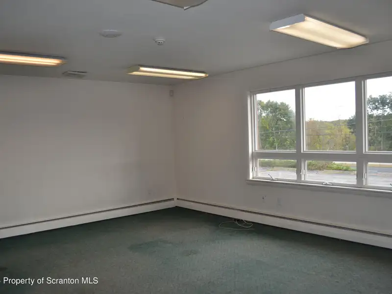 Multi-use Building on 1.14 Acres with Prime Highway Commercial Zoning
