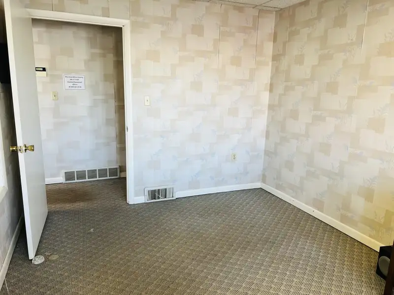 Historic Downtown Brick Building with Vault, Ideal for Office or Retail Conversion