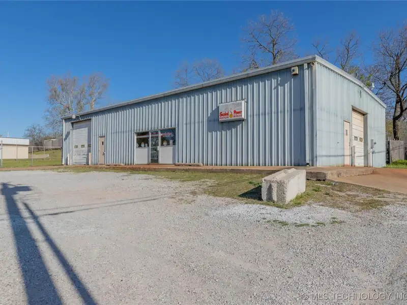 Versatile Former Machine Shop in Prime Downtown Sand Springs Location