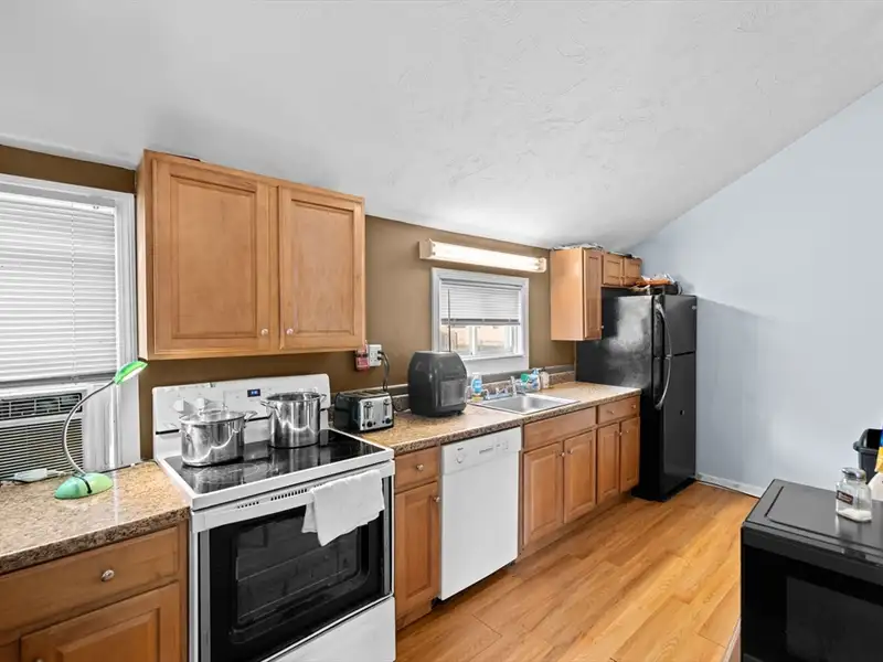 Versatile Multi-use Property with In-law Suite Potential and Heated Pool on Route 28