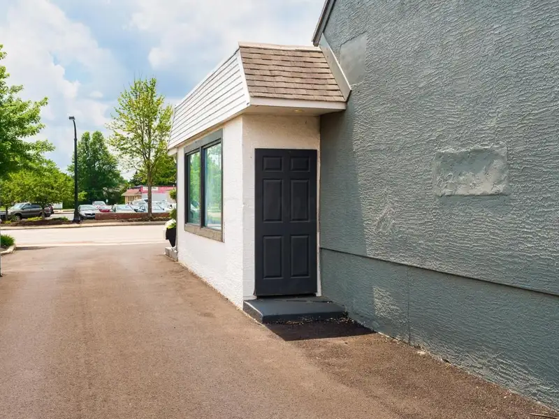 Prime Commercial Building in Downtown Reynoldsburg with Parking and Industrial Garage