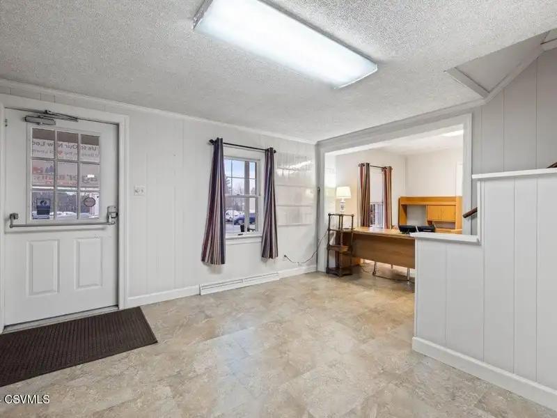 Flexible 4,000 Sf Commercial Building in Prime Location with High Visibility and Ample Parking
