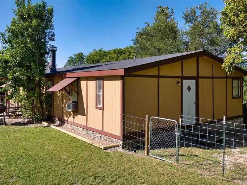 10-acre Mobile Home Community with 5 Units, Fenced, Workshop, and Growth Potential