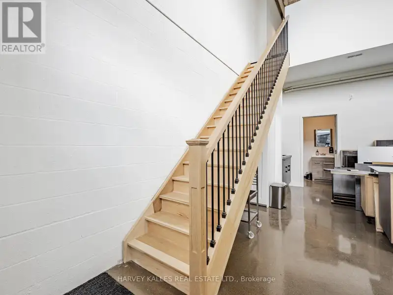 Fully Leased Commercial Condo in Prime Location on the Queensway