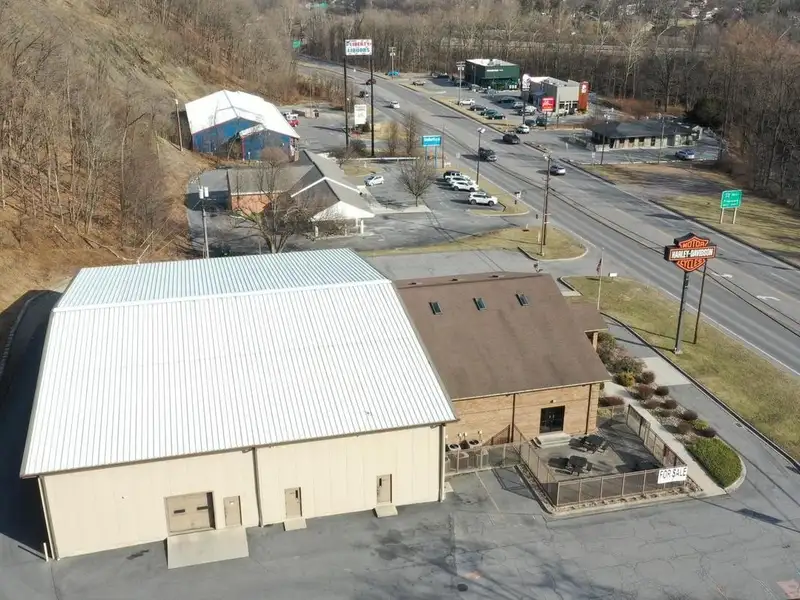 Versatile Commercial Property with Showroom, Offices, and Large Metal Building in Prime Location