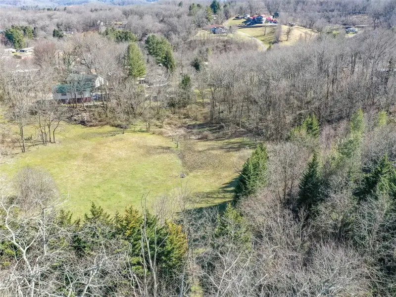 9.29 Acre Multi-family or Commercial Parcel in Waynesville Etj with City Utilities