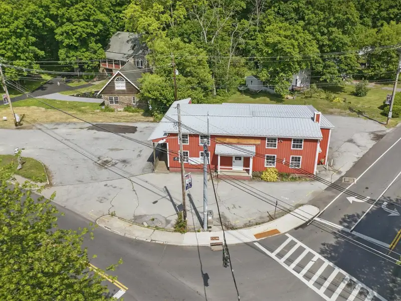Commercial Retail/warehouse with Charming Colonial Home in High-traffic Corner Location