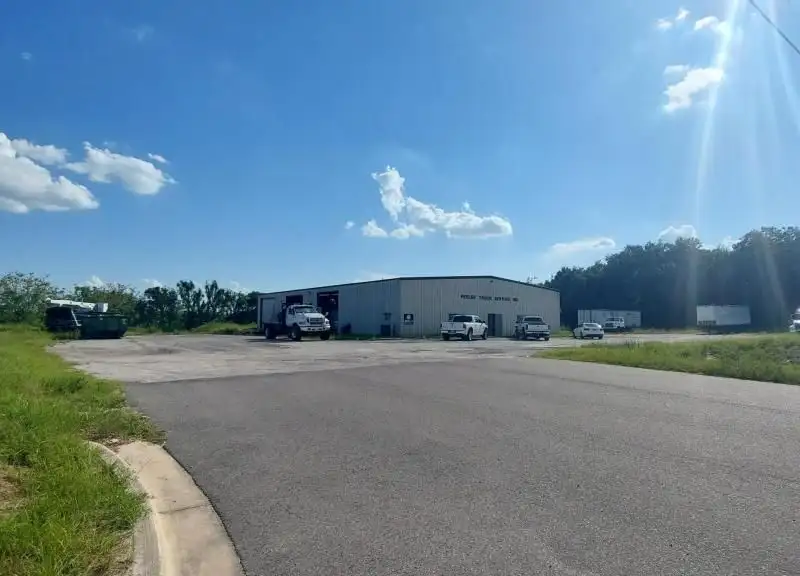 10.94-acre Commercial Property with 7,500 Sq Ft Warehouse on State Rd 46 Frontage