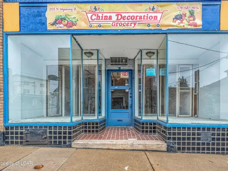 Five-unit Commercial and Residential Building in Prime Location with Recent Upgrades