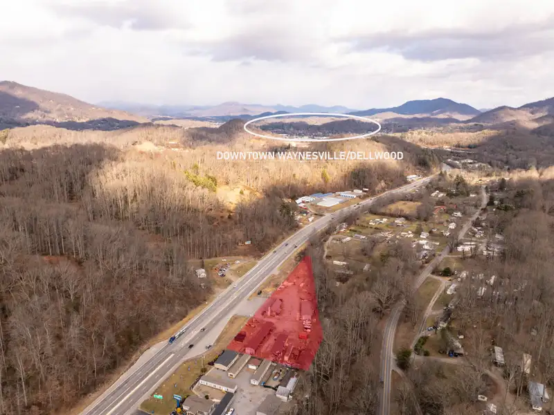 Versatile Commercial Property with Office Space and Garage Near Highway 23/74 Exit
