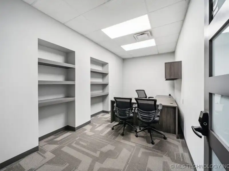 Historic Office Building with 9 Private Suites and Conference Room in Prime Location