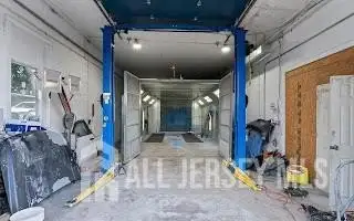 Turnkey Automotive Business with Car Dealership, Mechanic & Auto Body Shop in Prime Location