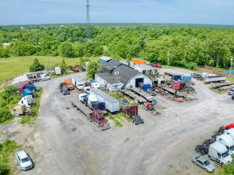 Commercial Property on 10 Acres Next to I-75, Includes Repair Shop and House