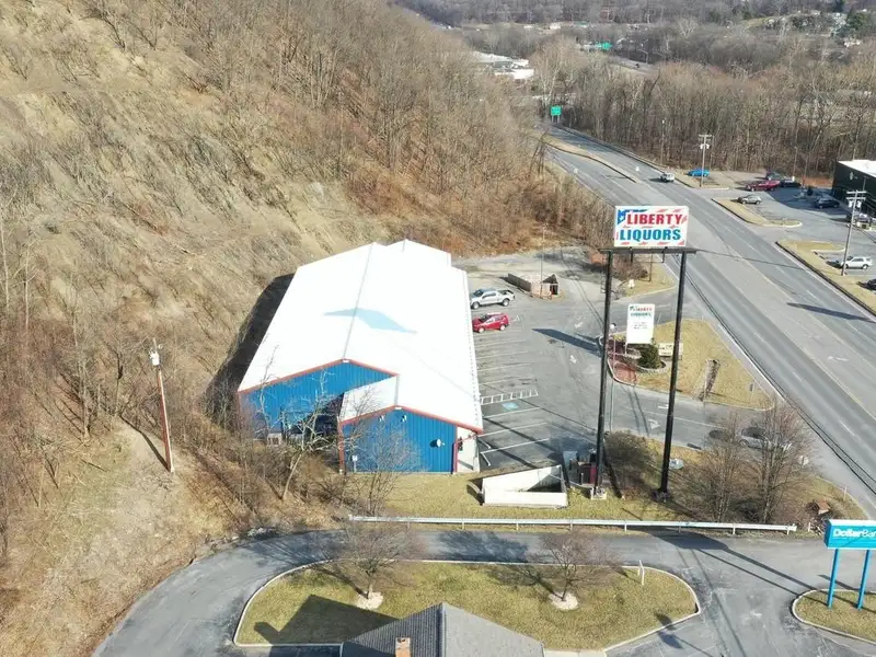 Versatile Commercial Property with Showroom, Offices, and Large Metal Building in Prime Location