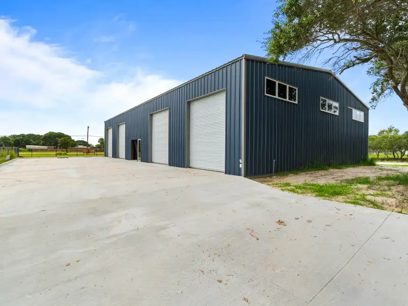5,700 Sq Ft Warehouse on ½ Acre in Rockport, Texas with Highway Access and Parking