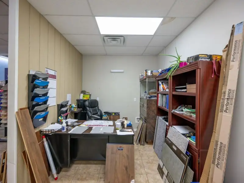 Large Commercial Building on Highway 412e in Parsons with Extensive Frontage and Warehouse Space