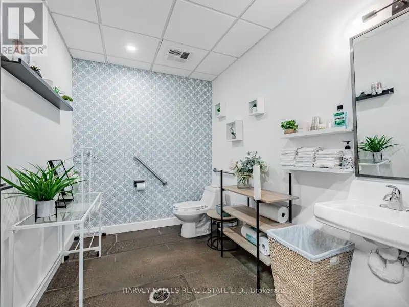Fully Leased Commercial Condo in Prime Location on the Queensway