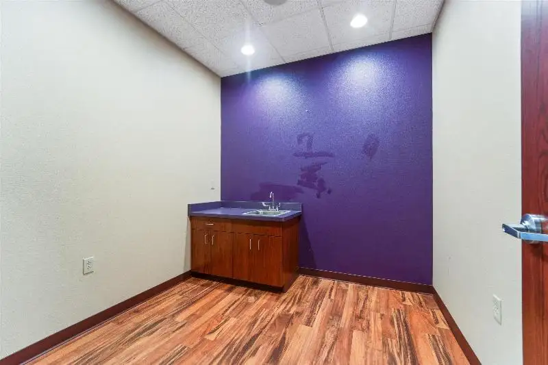 Versatile Commercial Condo for Sale Near Hwy 151 & 41 with Multiple Offices and Amenities