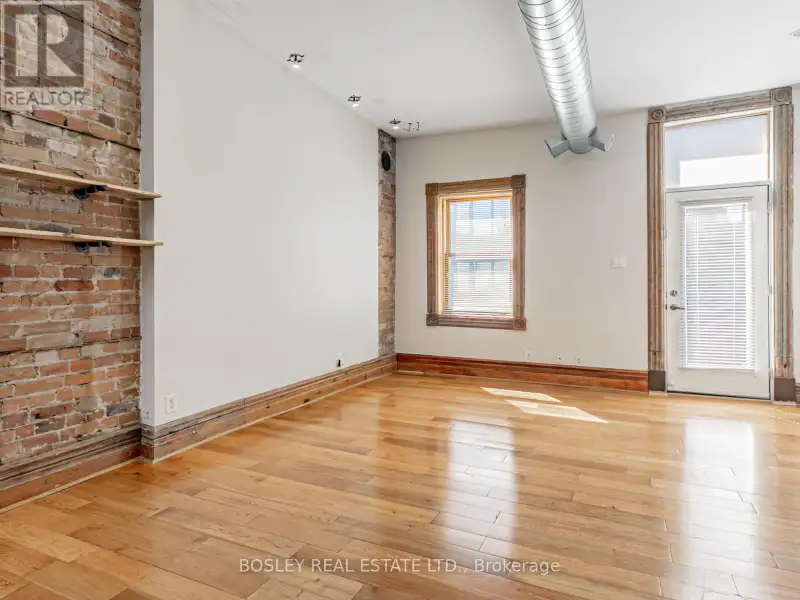 Charming Two-storey Apartment in Landmark Building on Queen St West