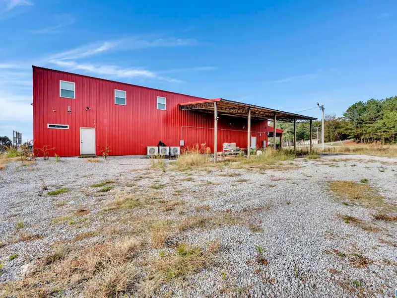 Prime Commercial Property Near Smith Lake with 3,800 Sq Ft Building and Billboard Income