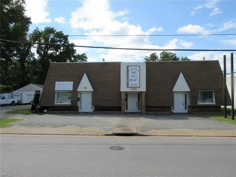 Turnkey Fully Leased Office Building with Garages in Prime Langley Afb Location