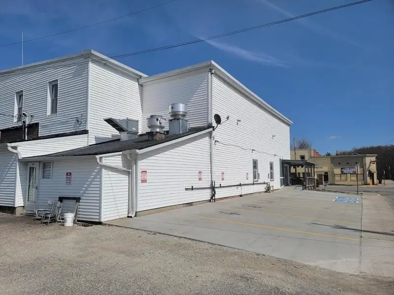 Investment Opportunity: Restaurant with Apartment and Additional Parking Near I-74