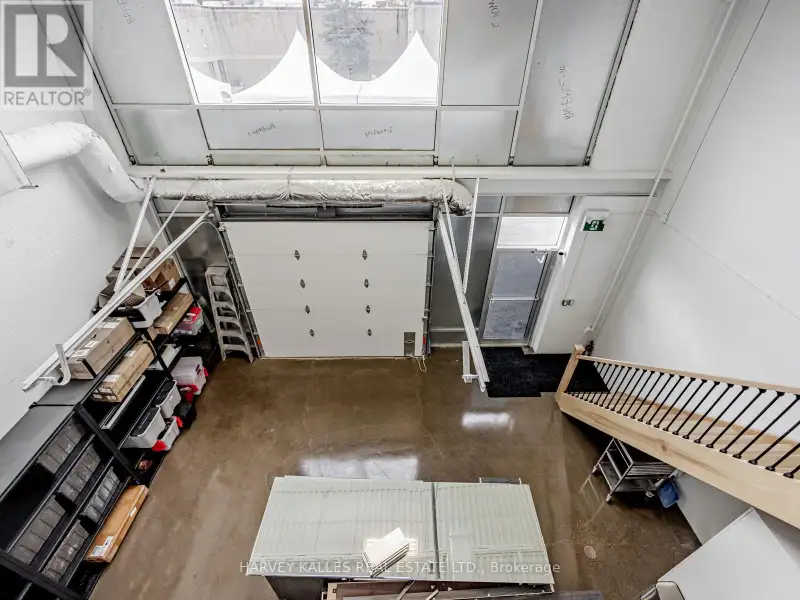 Fully Leased Commercial Condo in Prime Location on the Queensway