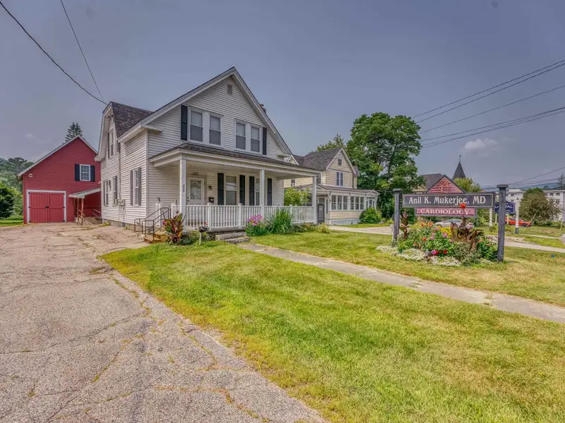 Versatile Mixed-use Property on Cottage Street, Littleton with Office Spaces and Barn