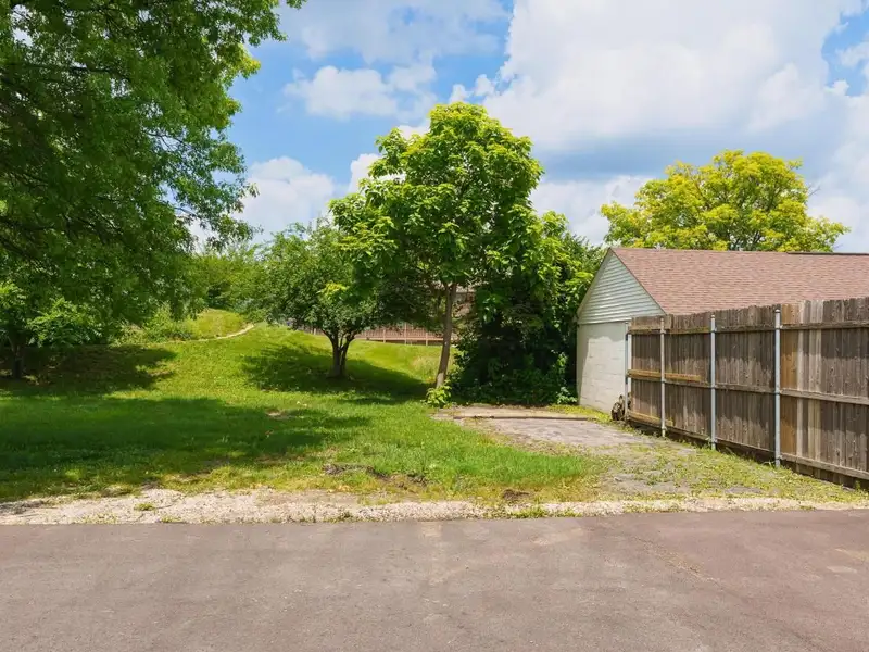 Prime Commercial Building in Downtown Reynoldsburg with Parking and Industrial Garage