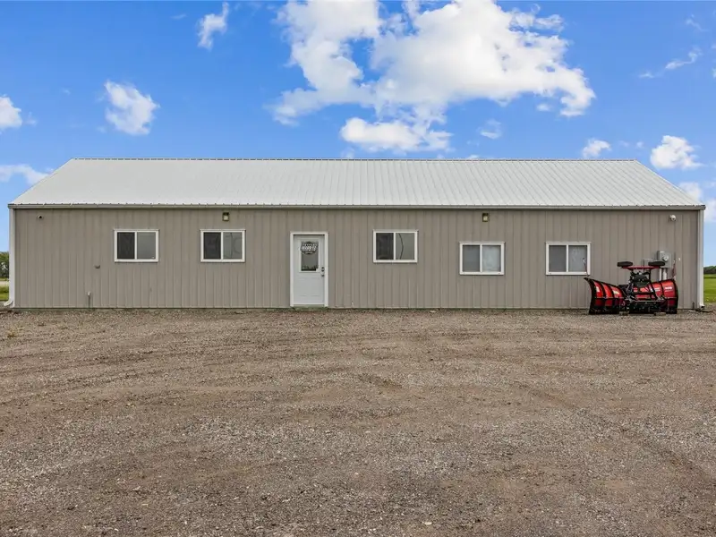 Commercial Building on Highway 20 Near Jesup, Ia with 4 Acres of Potential