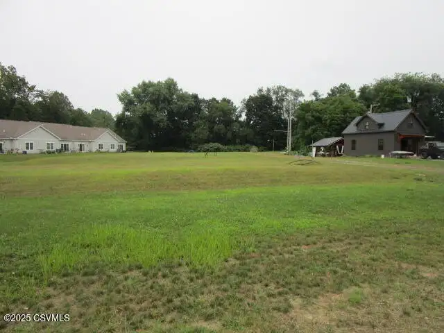 Partially Built Condo Development with Approved Plans in Picturesque Location