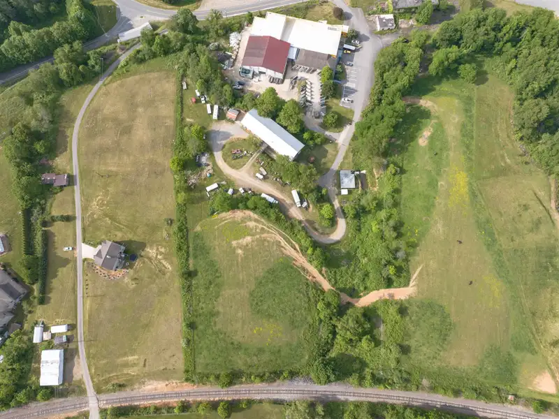Historic 1918 Stone Building with 3.99 Acres and Detached Workshop in Balsam Road Area